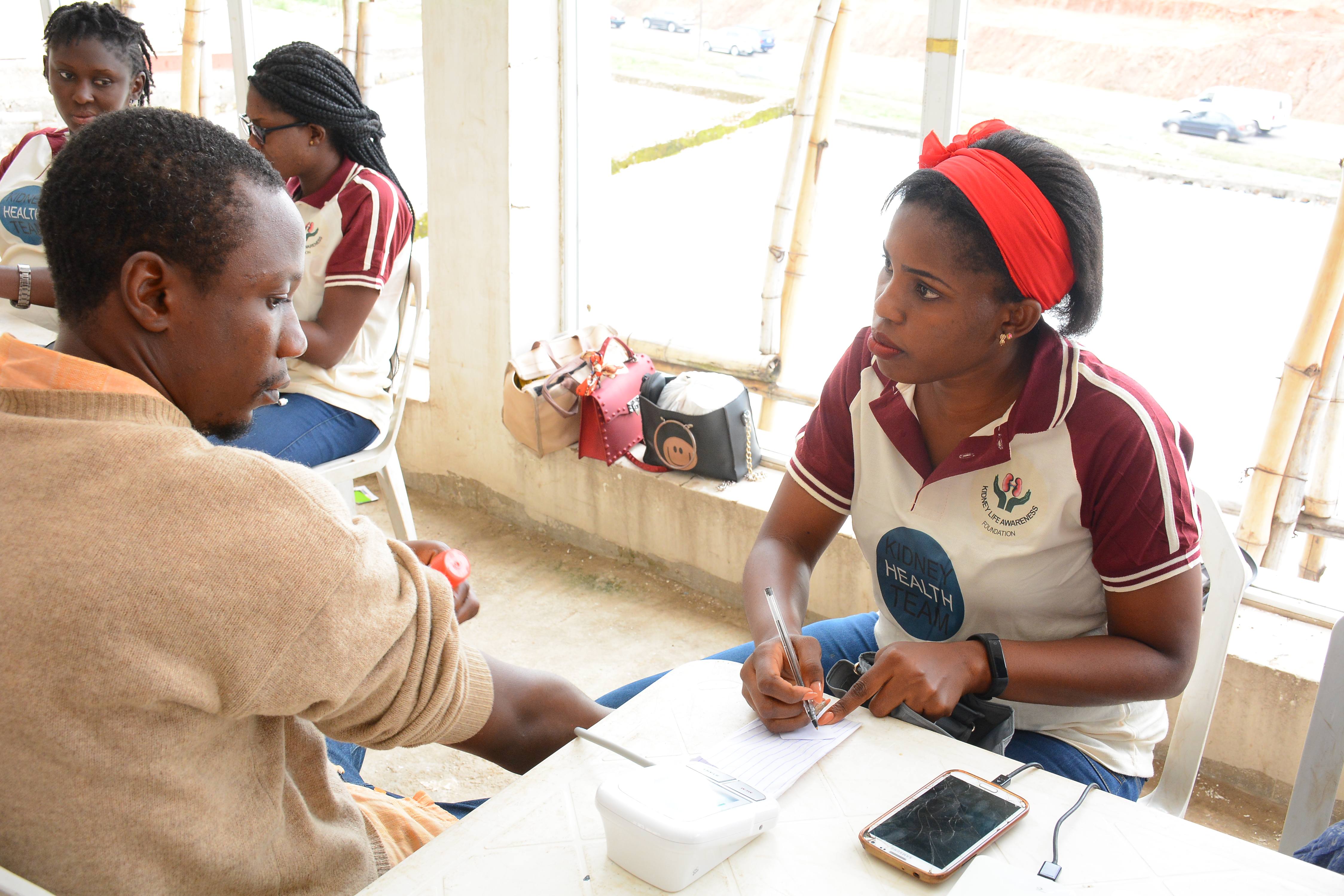 Health team member counseling community member